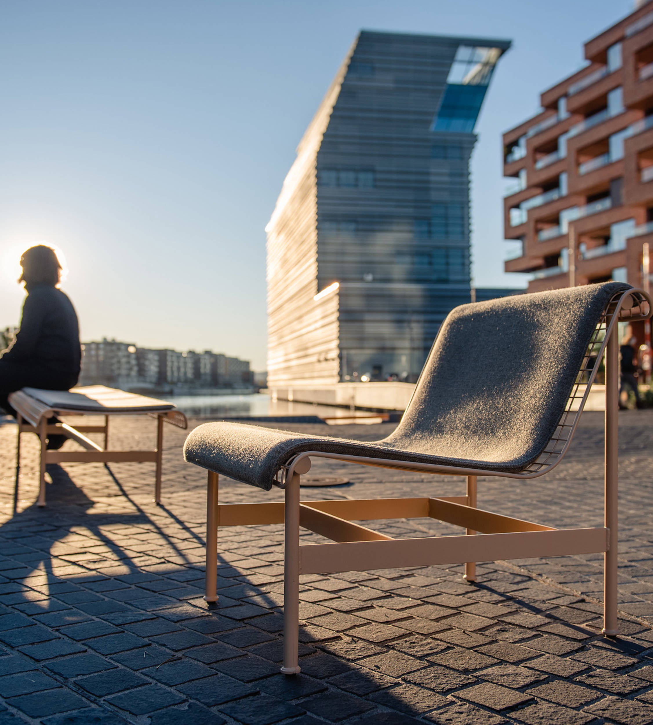 Outdoor chairs in patio area near Oslo's Munch museum